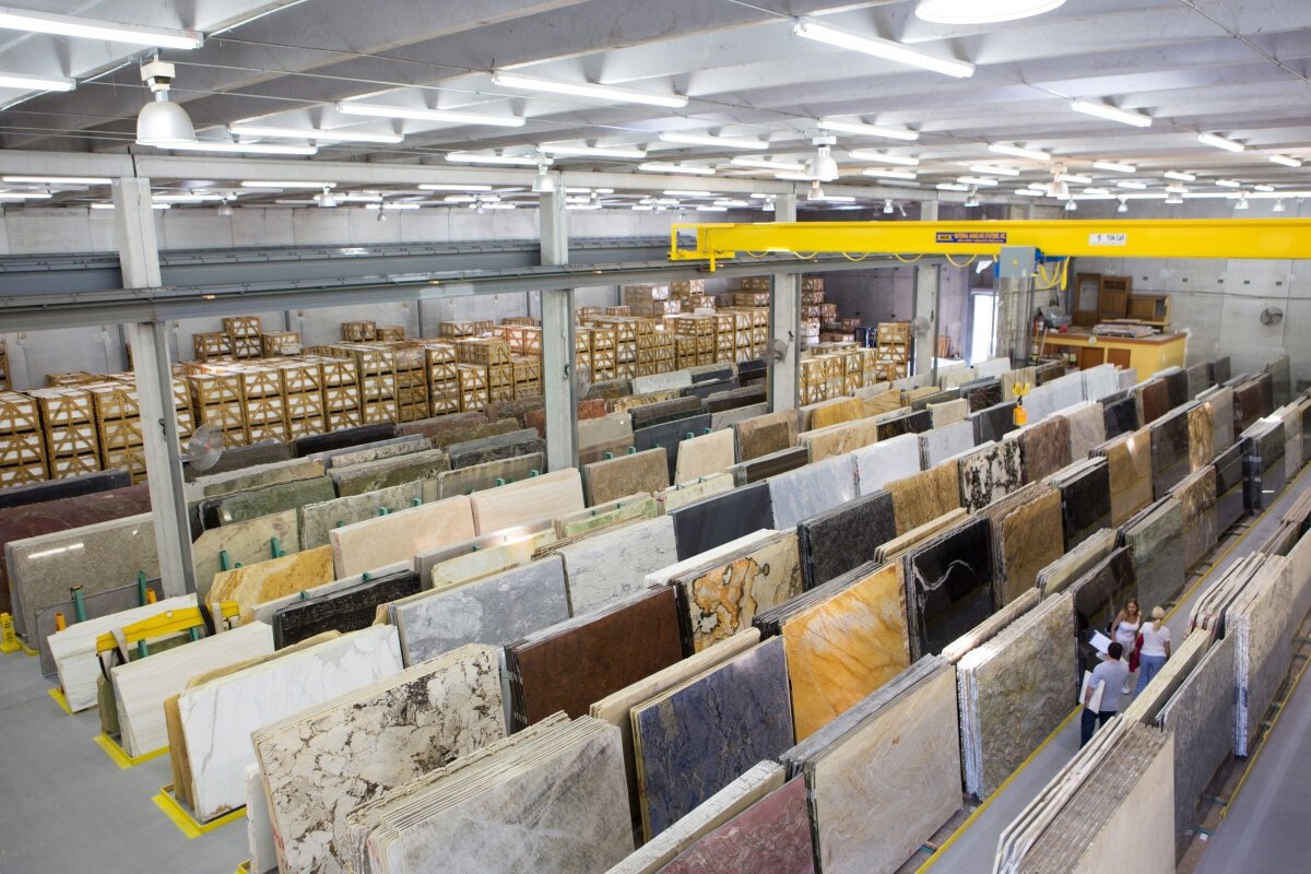 Bkstone stone slabs and paving materials displayed in a showroom